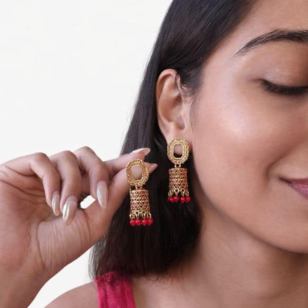 gold oxidized cutwork drop earrings with blue beads gold oxidized cutwork drop earrings with blue beads